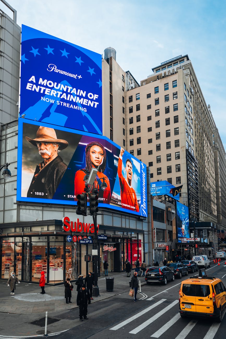 billboards on building in city downtown